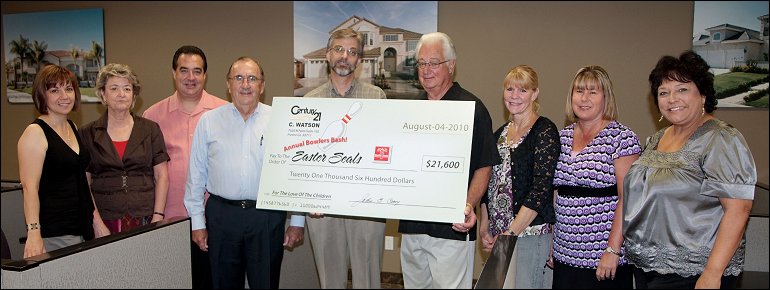 Easter Seals, Central California received a check in the amount of $21,600 from John Carey, Sr. President of Century 21 C. Watson